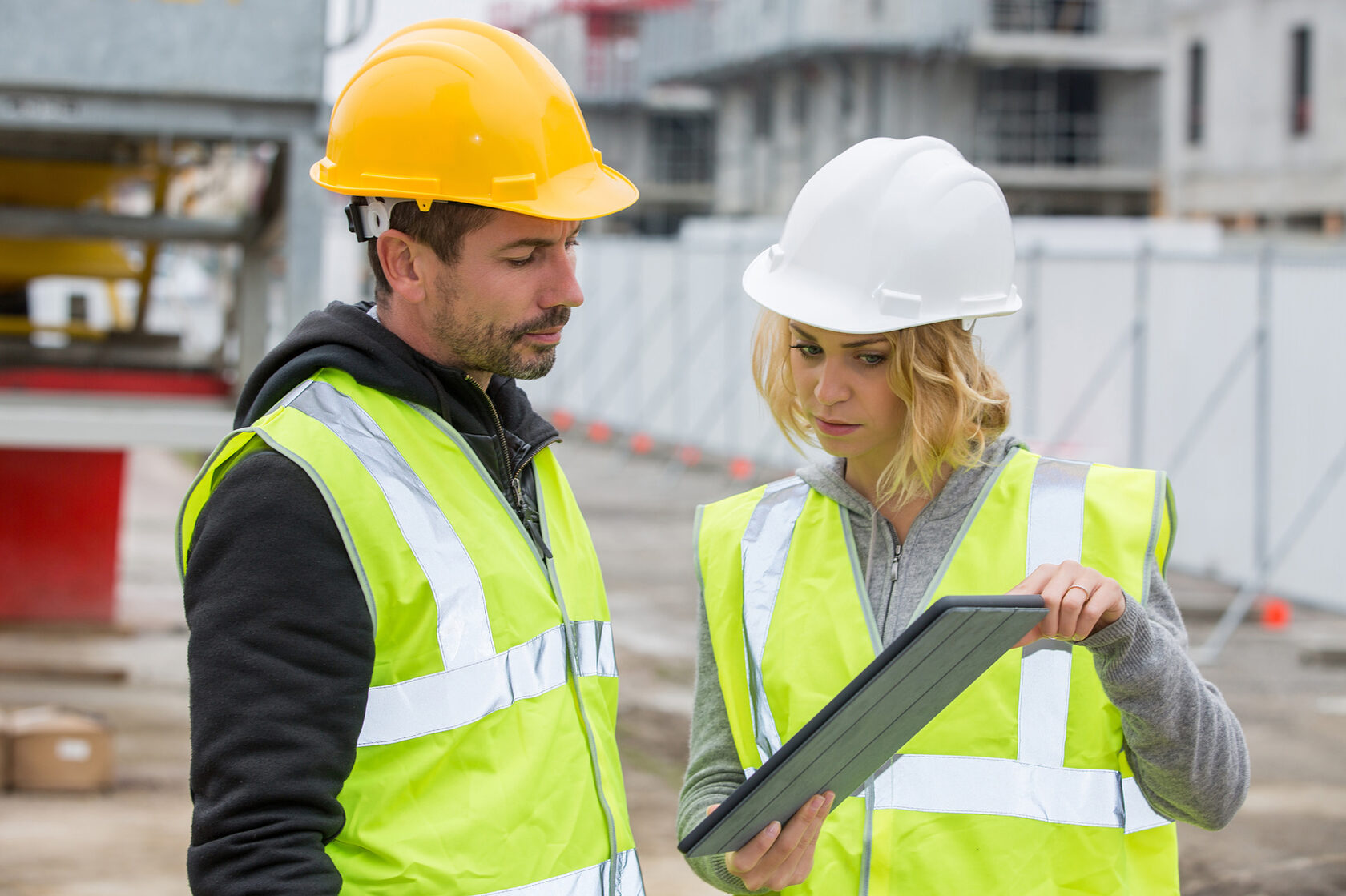 Two workers are discussing about the work