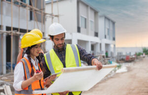 Two Construction workers are talking 