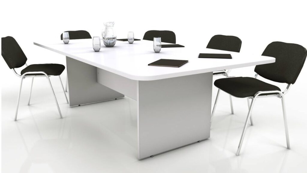 Modern modular office workstations with ergonomic chairs in a Noida office setup