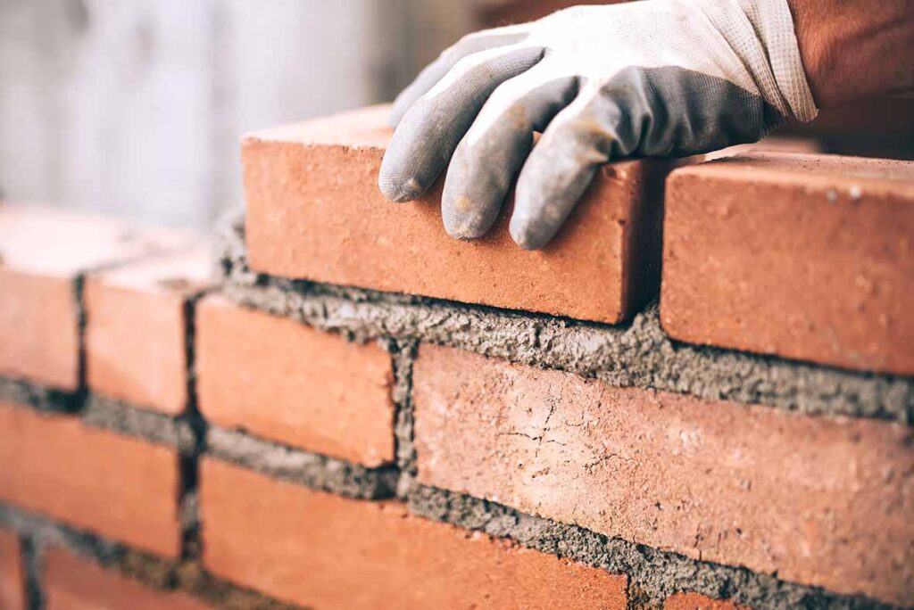 How Do Professionals Ensure Durability in Brick and Stone Structures?